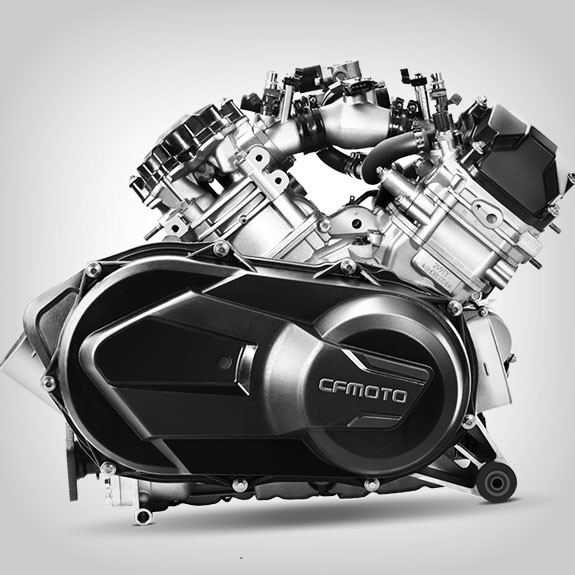 sxs_uforce-1000_fh-1 A side view of a CFMOTO UFORCE 1000 motorcycle engine, showcasing its mechanical components and casing against a plain background.