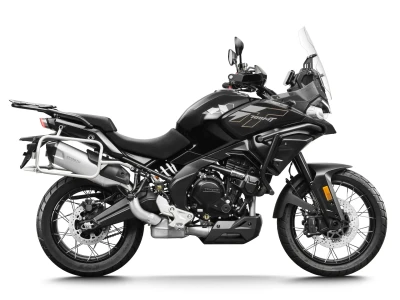 Side view of a black 450MT adventure motorcycle with spoked wheels, windscreen, and rear luggage rack, photographed against a white background.