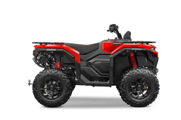 Side view of a red CFMOTO all-terrain vehicle (ATV) built on the reliable CFMOTO C Platform, featuring black tyres, red suspension springs, and a black seat against a white background.